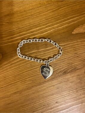 “S” initial heart bracelet on silver tone with shiny silver tone chain 7”